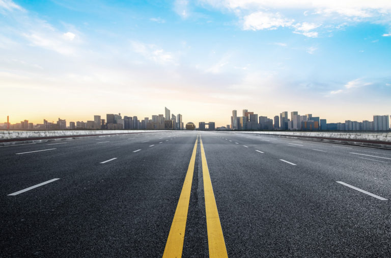A Roadmap for Adapting Your IFM SOW to Meet the Demands of 2021 and Beyond Empty Road Buildings Horizon